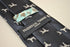 black tie with white dog silhouette design